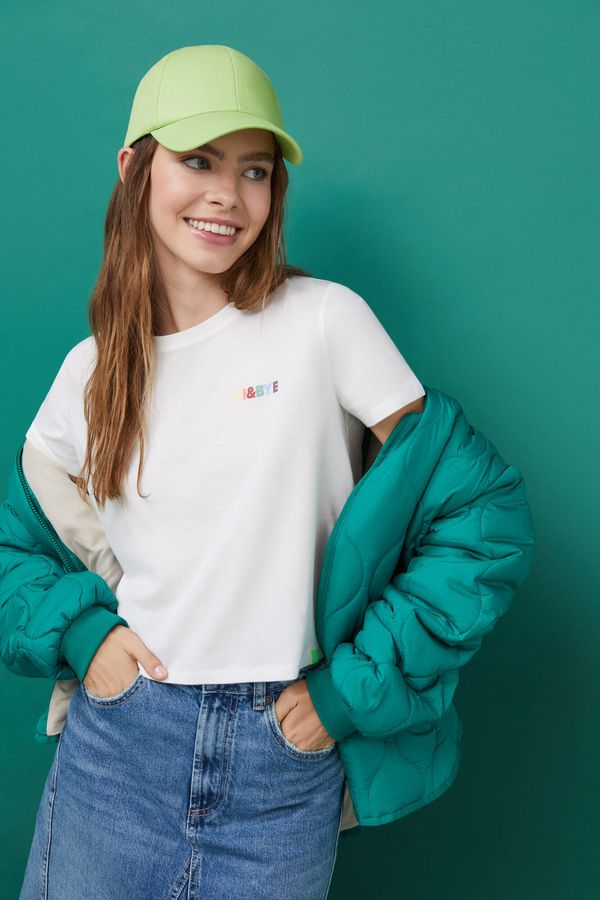 Camiseta 100% algodón crudo mini logo