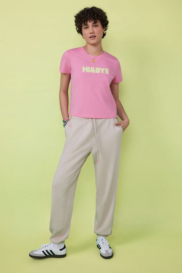 Camiseta 100% algodón rosado logo