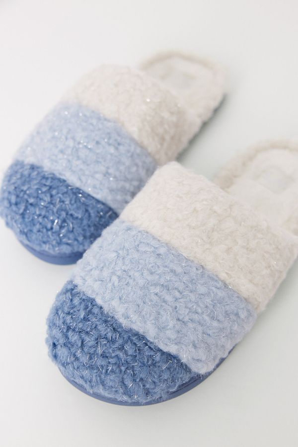 Pantuflas efecto pelo azul