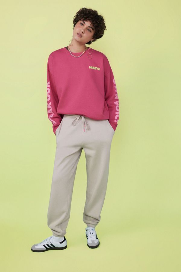 Pantalón largo jogger felpa beige
