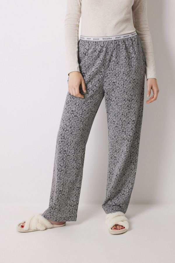 Pantalón estampado flores verdes