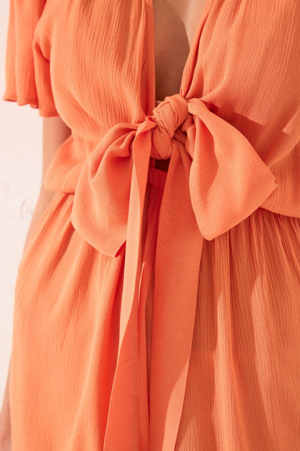 Jumpsuit corto viscosa naranja