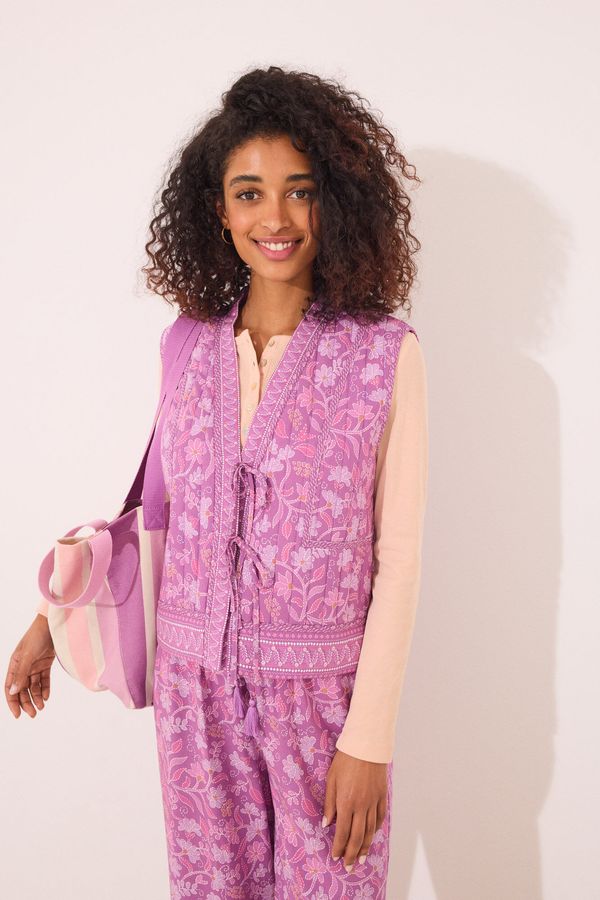 Chaleco acolchado morado print floral