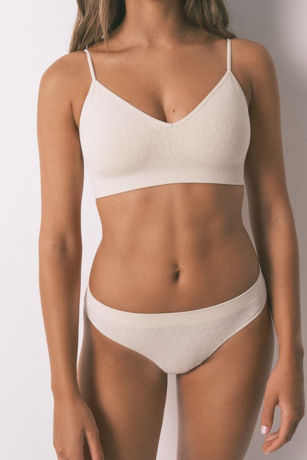 Tanga sin costuras animal print beige