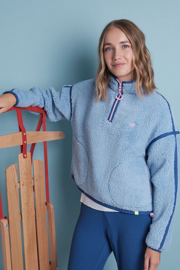 Buzo borreguito suave azul logo