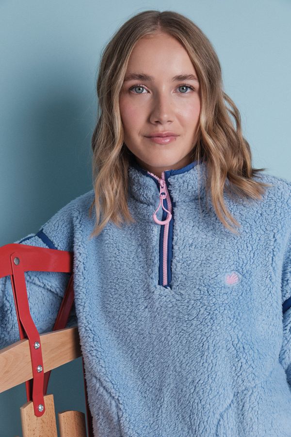 Buzo borreguito suave azul logo