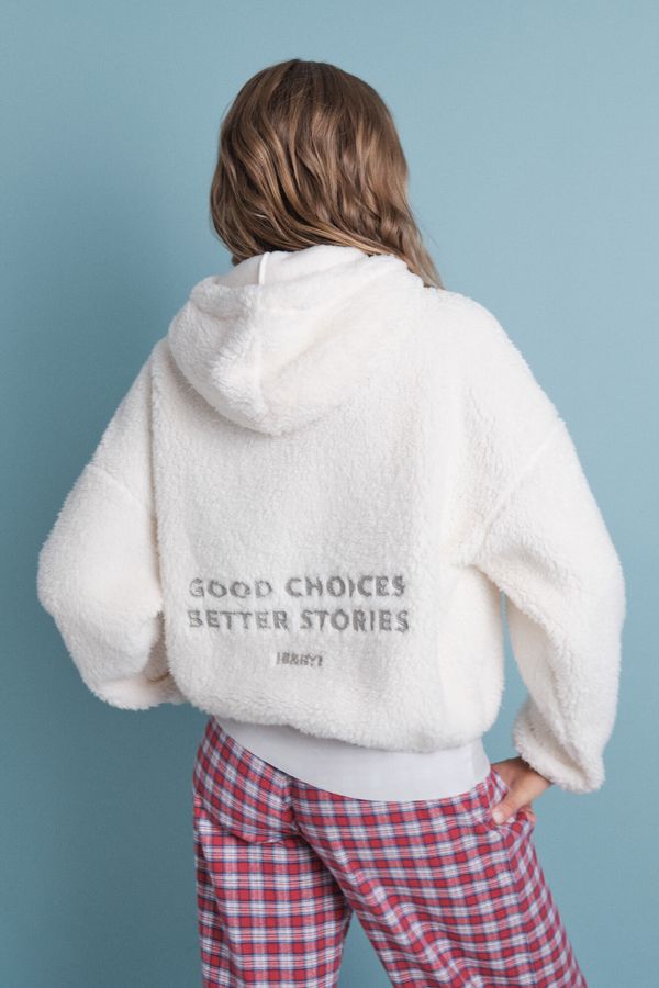 Buzo borreguito suave blanco logo